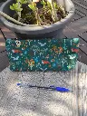 Trousse verte motif animaux