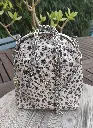 Sac à main en tissu beige fleuri